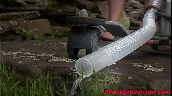 BDSM sub predominated with clyster and restrain bondage