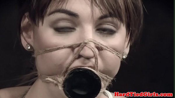 BDSM sub tied up and whipped by male domination