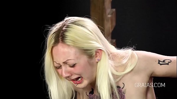 Caning the blonde nymph