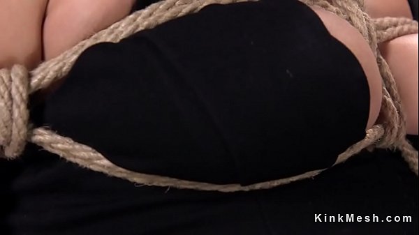 Babe in bondage gets feet tormented