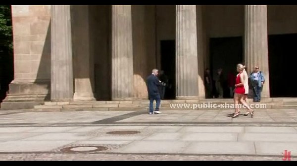 Blonde sex slave undressed in public