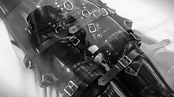 Rubber doll masturbates, then is bound and vibrate