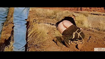 Submissive babe gets an asshole whipping before getting butt fucked on pee-covered ground — a hard, genuine domination adventure out in nature (Rebel Rhyder)