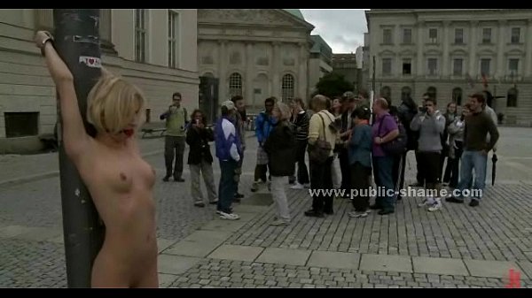 Brunette cutie licks shooes in public