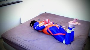 Self bondage hogtie fail in blue and orange
