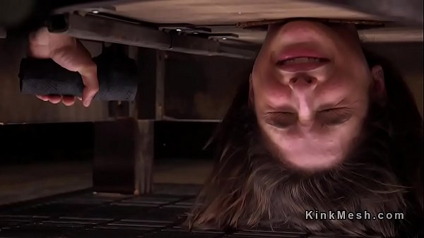 With neck in hole slave got spanked