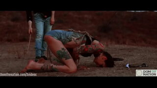 Ass eating bondage slave cries while her feet get caned outdoors in the dirt – Rocky Emerson